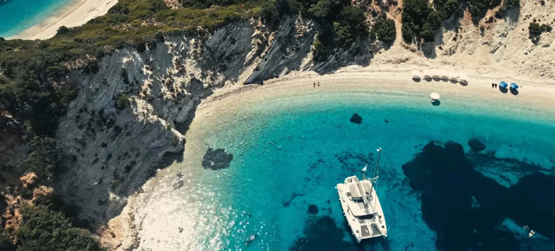 Aerial view of a catamaran at gidaki bay, Ithaca, central ionian islands.
