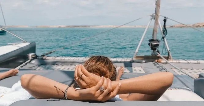 Relaxing onboard a catamaran.