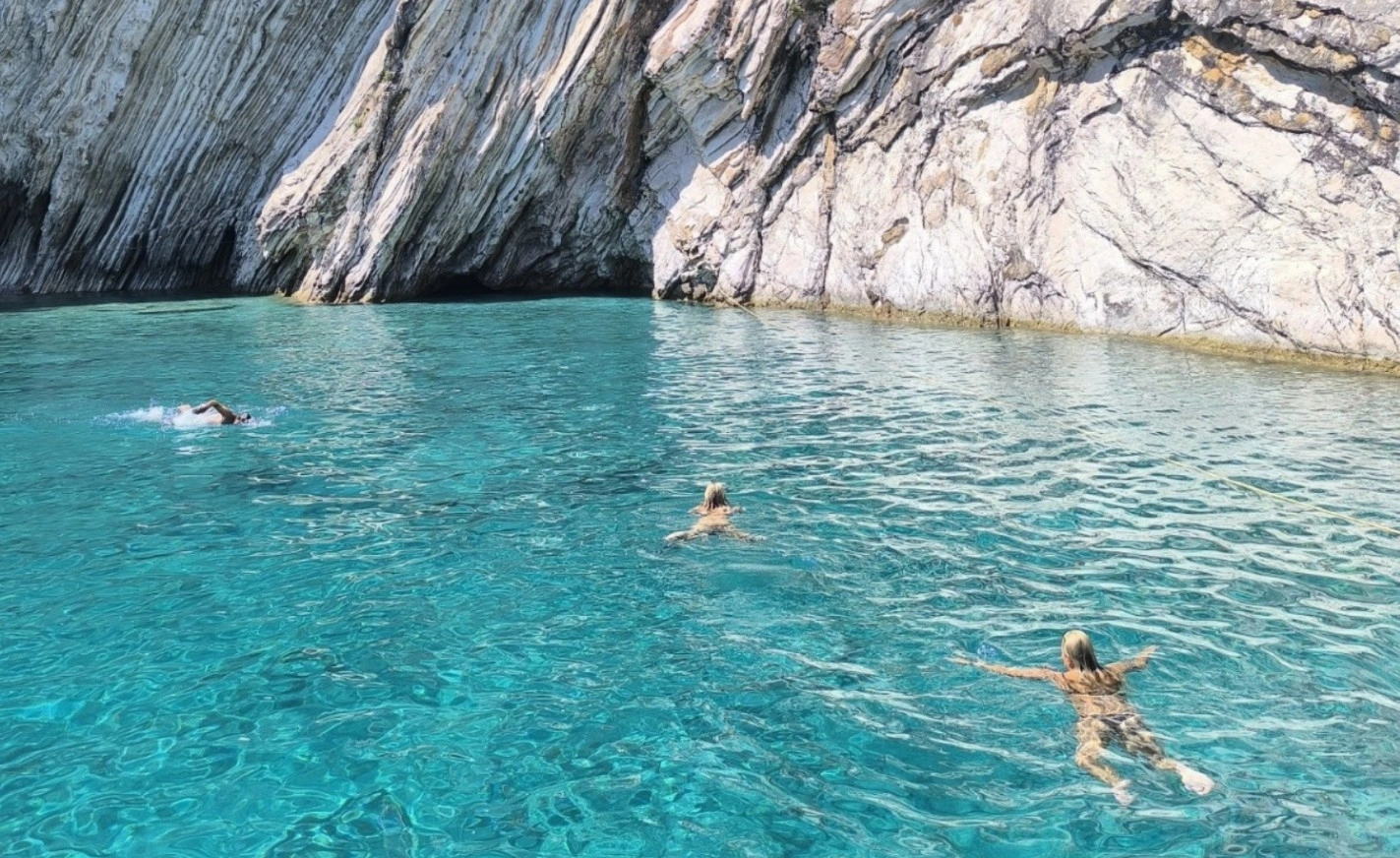 swimming at crystal clear waters, Ionian islands